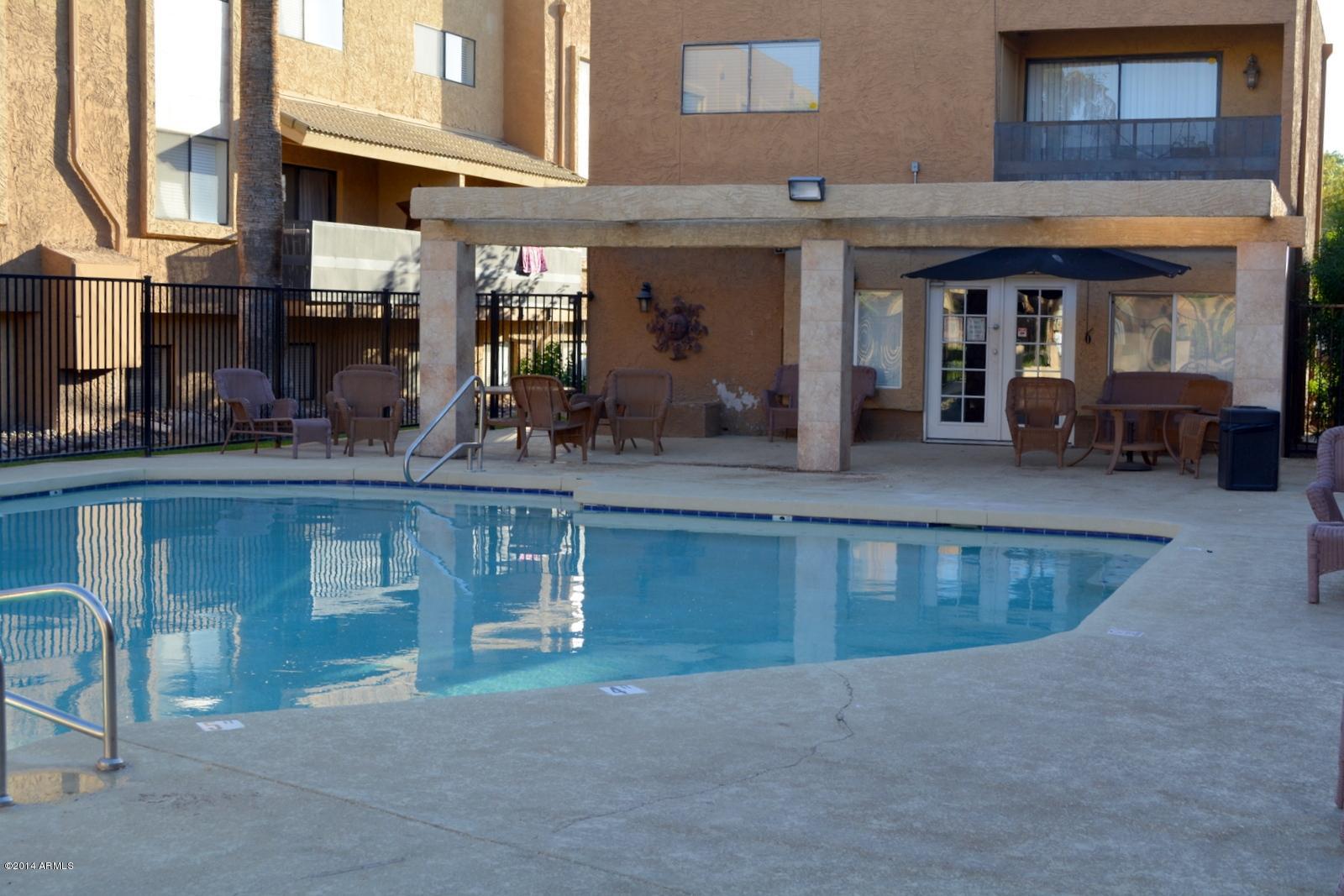 5401 East Thomas Road, Unit 1032 Phoenix, AZ 85018 - Photo 28 of 34 a view of a building with sitting area