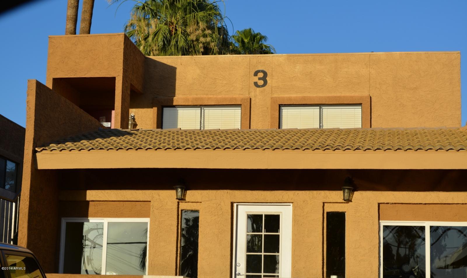 5401 East Thomas Road, Unit 1032 Phoenix, AZ 85018 - Photo 30 of 34 a black and white house with a outdoor space