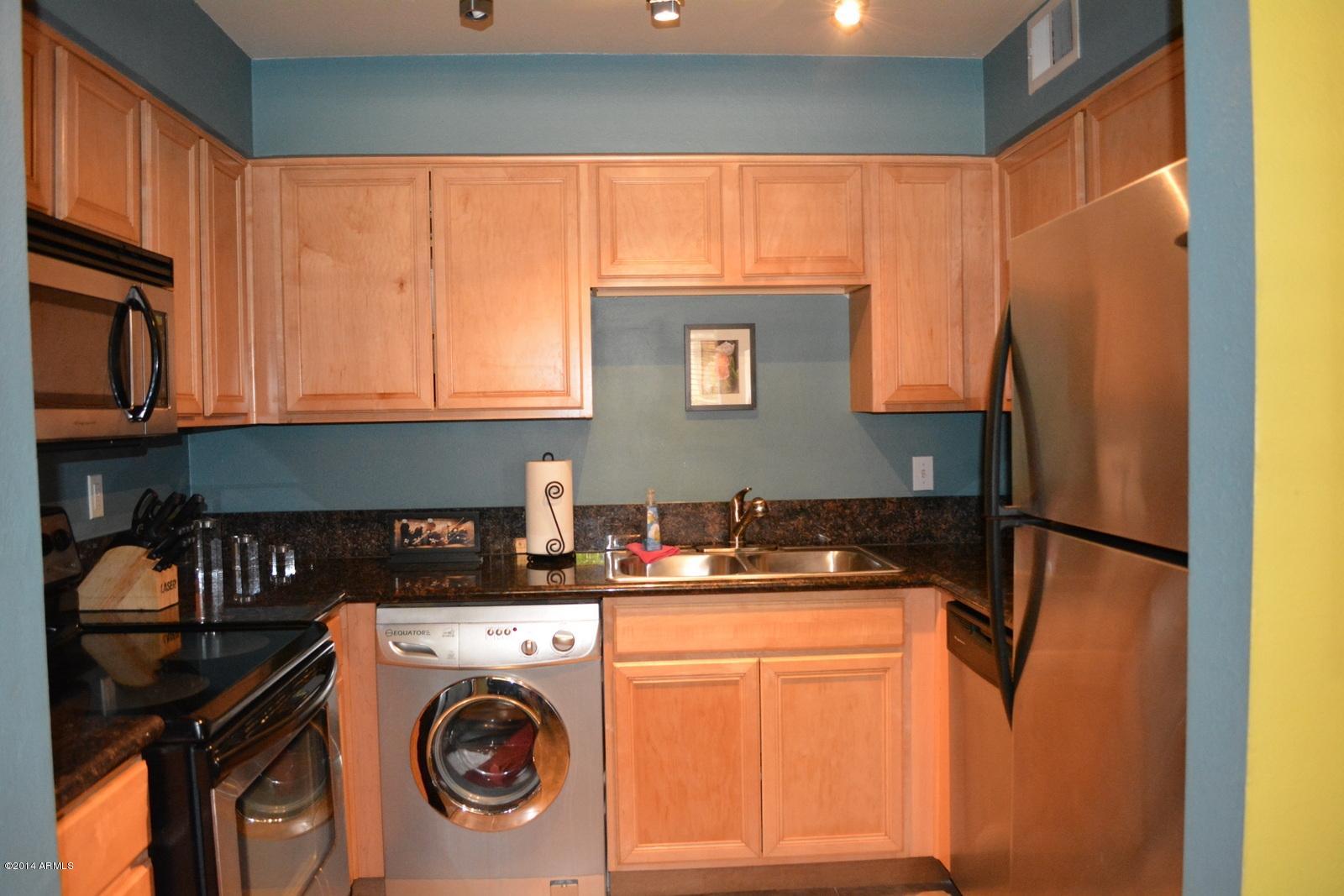 5401 East Thomas Road, Unit 1032 Phoenix, AZ 85018 - Photo 4 of 34 a utility room with closet dryer and washer