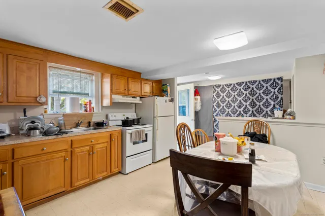 a bathroom with a sink and toilet