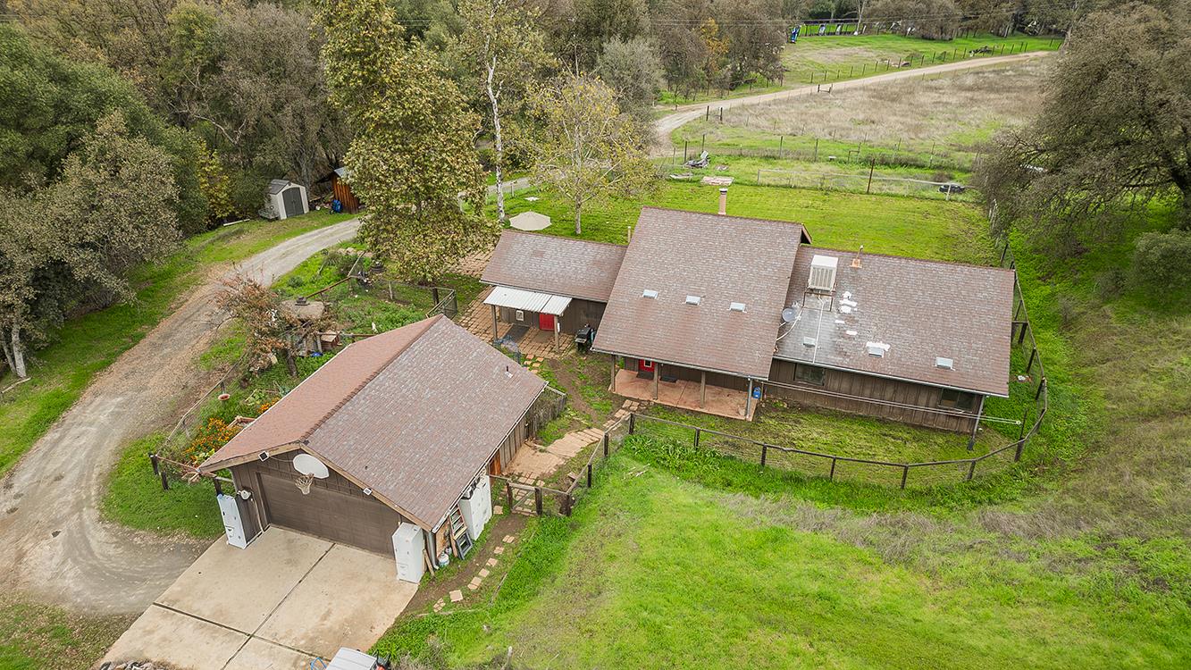 30240 Watts Valley Road Tollhouse, CA 93667 - Photo 54 of 65 an aerial view of a house with a yard and lake