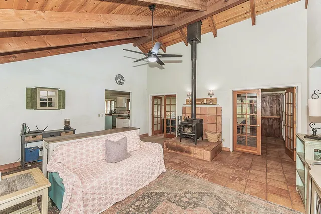 a dining room with furniture and chandelier