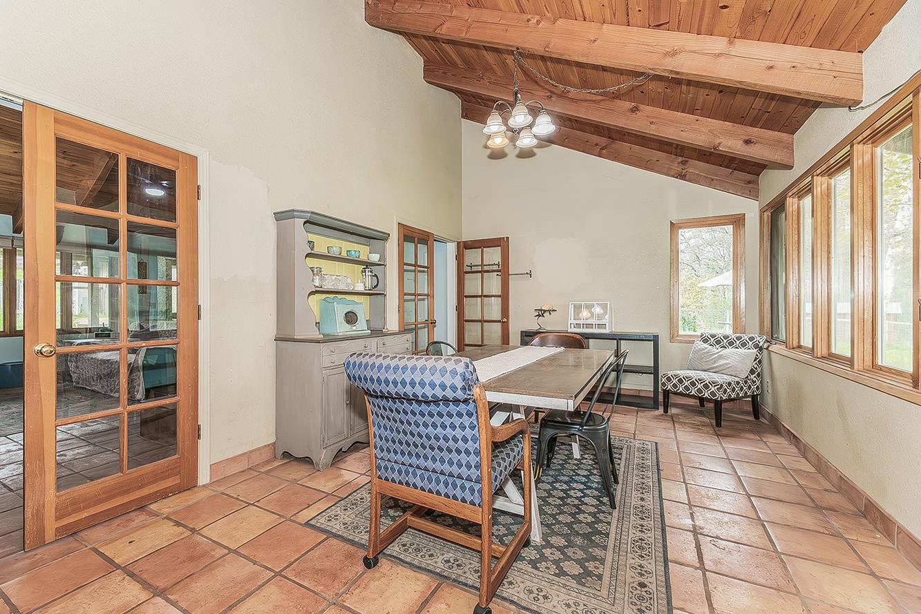 30240 Watts Valley Road Tollhouse, CA 93667 - Photo 10 of 65 a dining room with furniture and chandelier