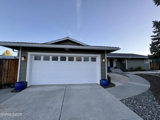 a front view of a house with yard