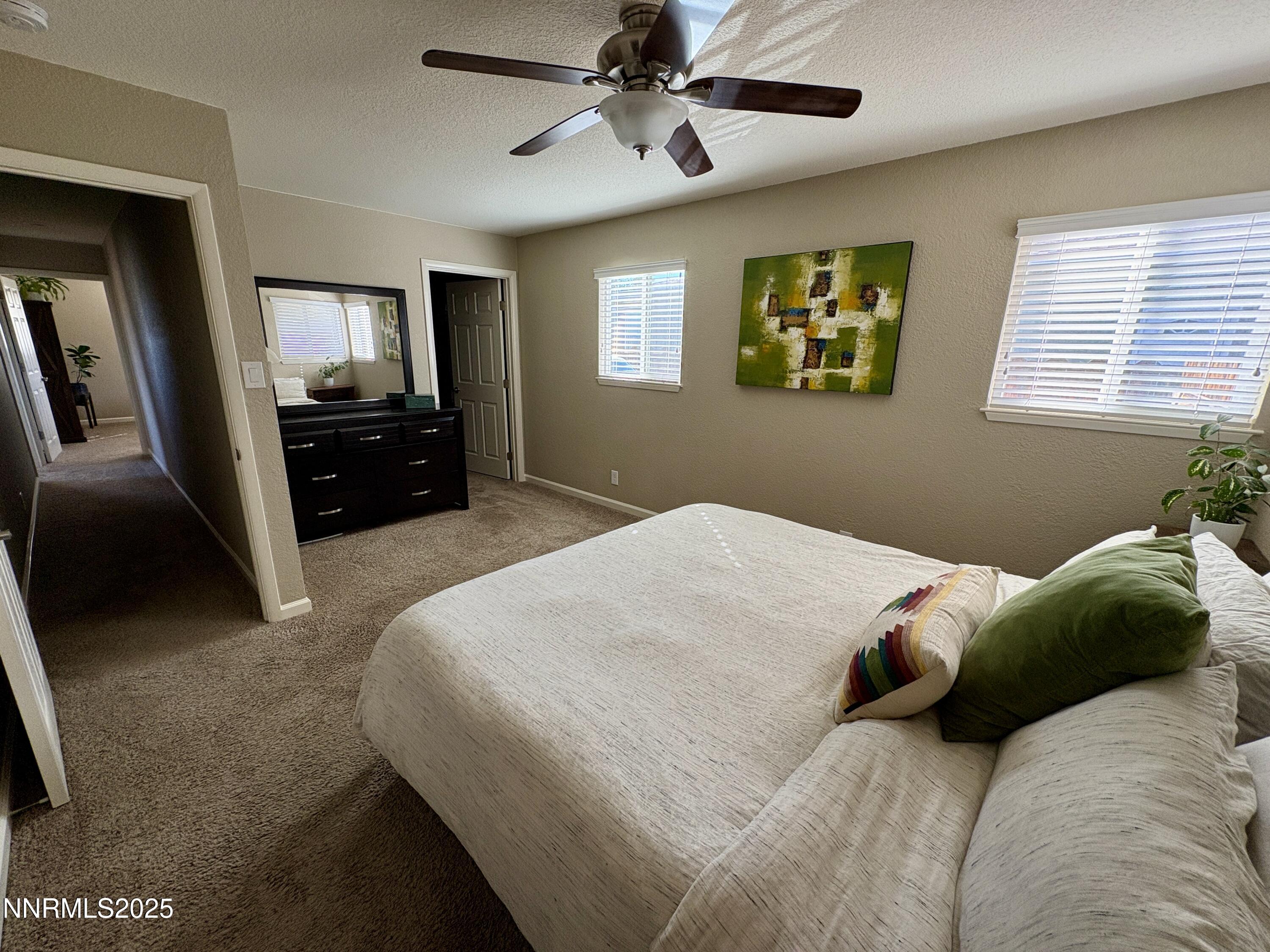 2000 Royal Drive Reno, NV 89503 - Photo 12 of 33 a bedroom with a bed and a television