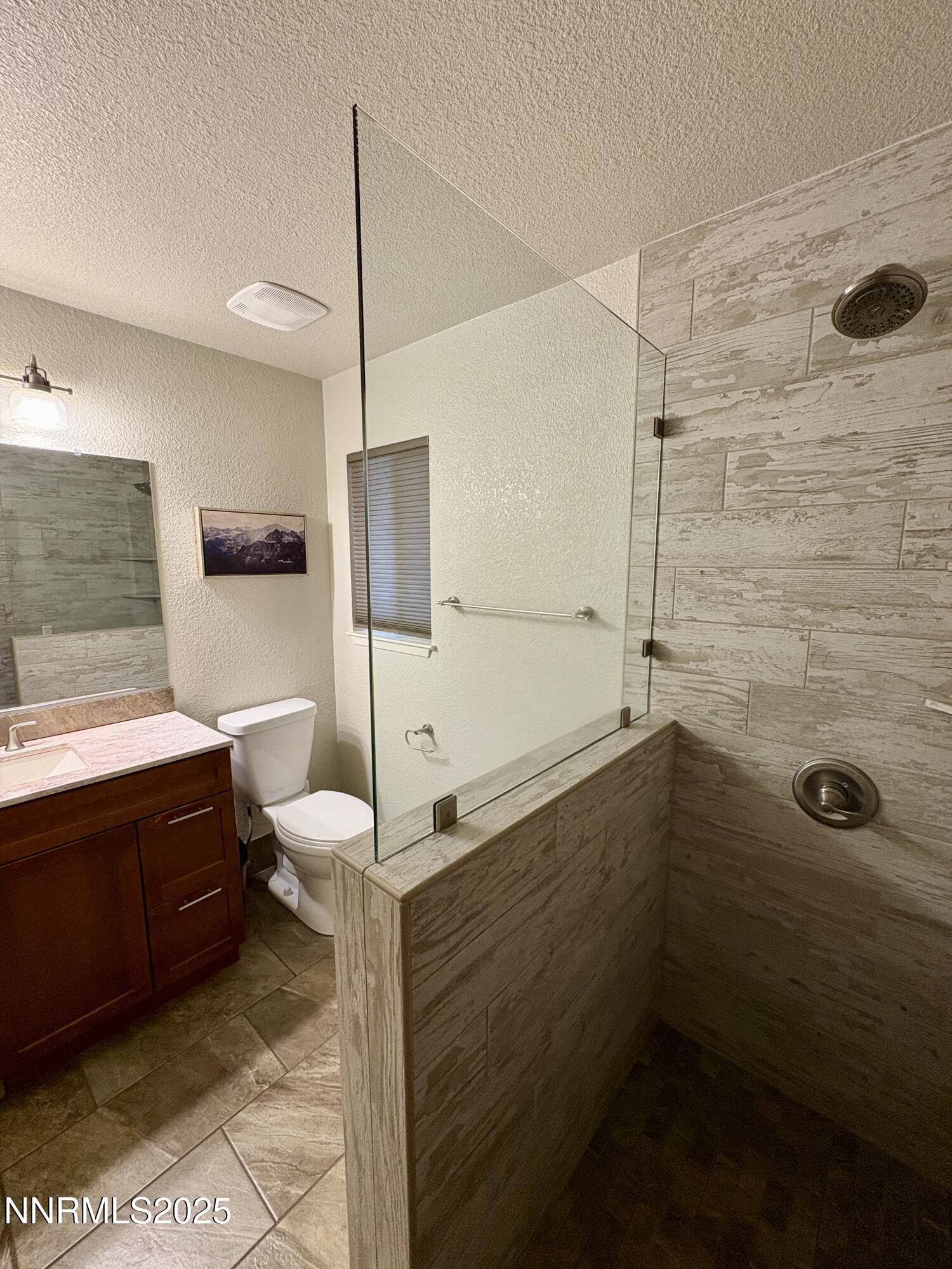 2000 Royal Drive Reno, NV 89503 - Photo 14 of 33 a bathroom with a shower and a sink
