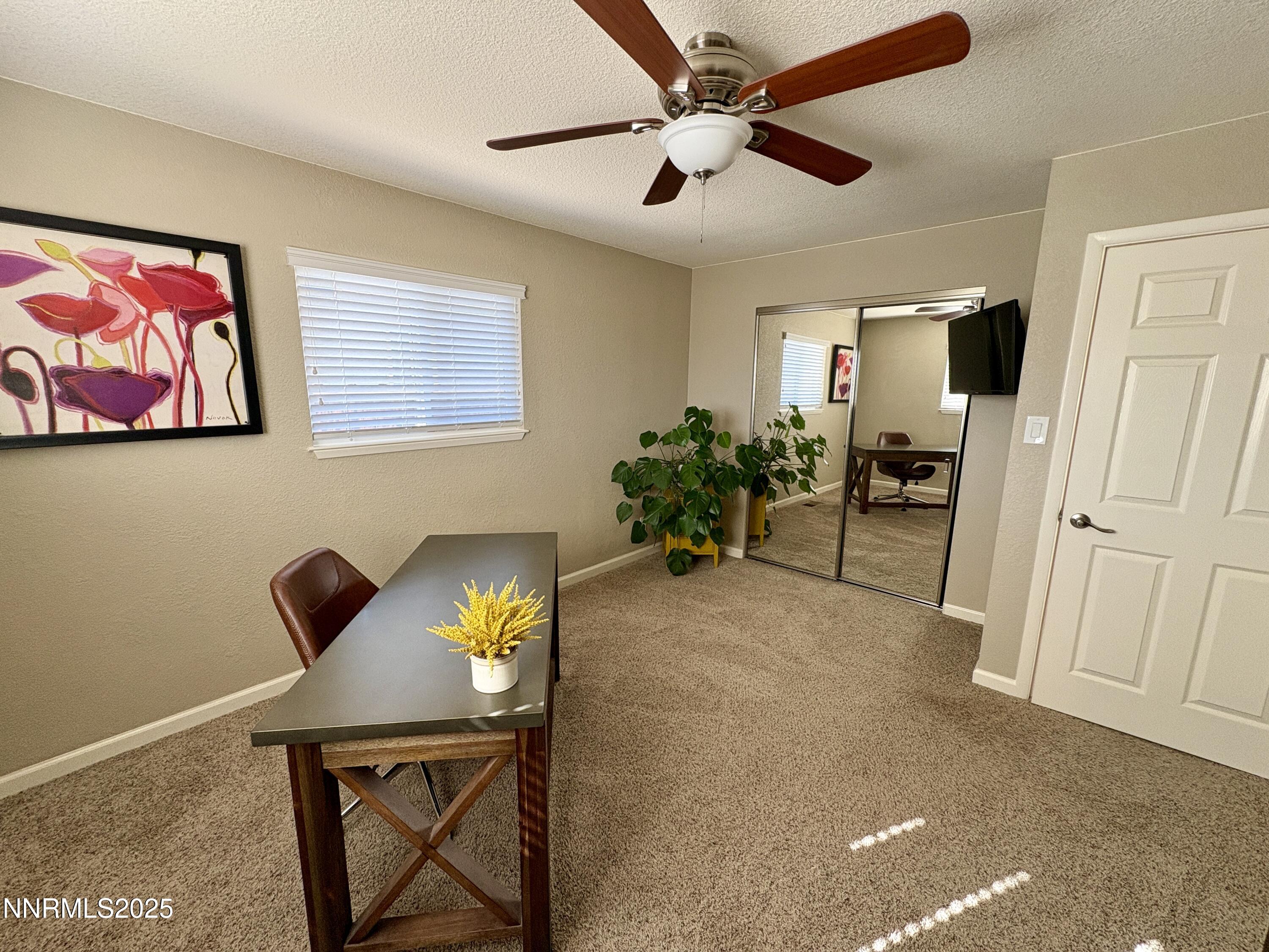 2000 Royal Drive Reno, NV 89503 - Photo 22 of 33 a view of a livingroom with furniture and a potted plant