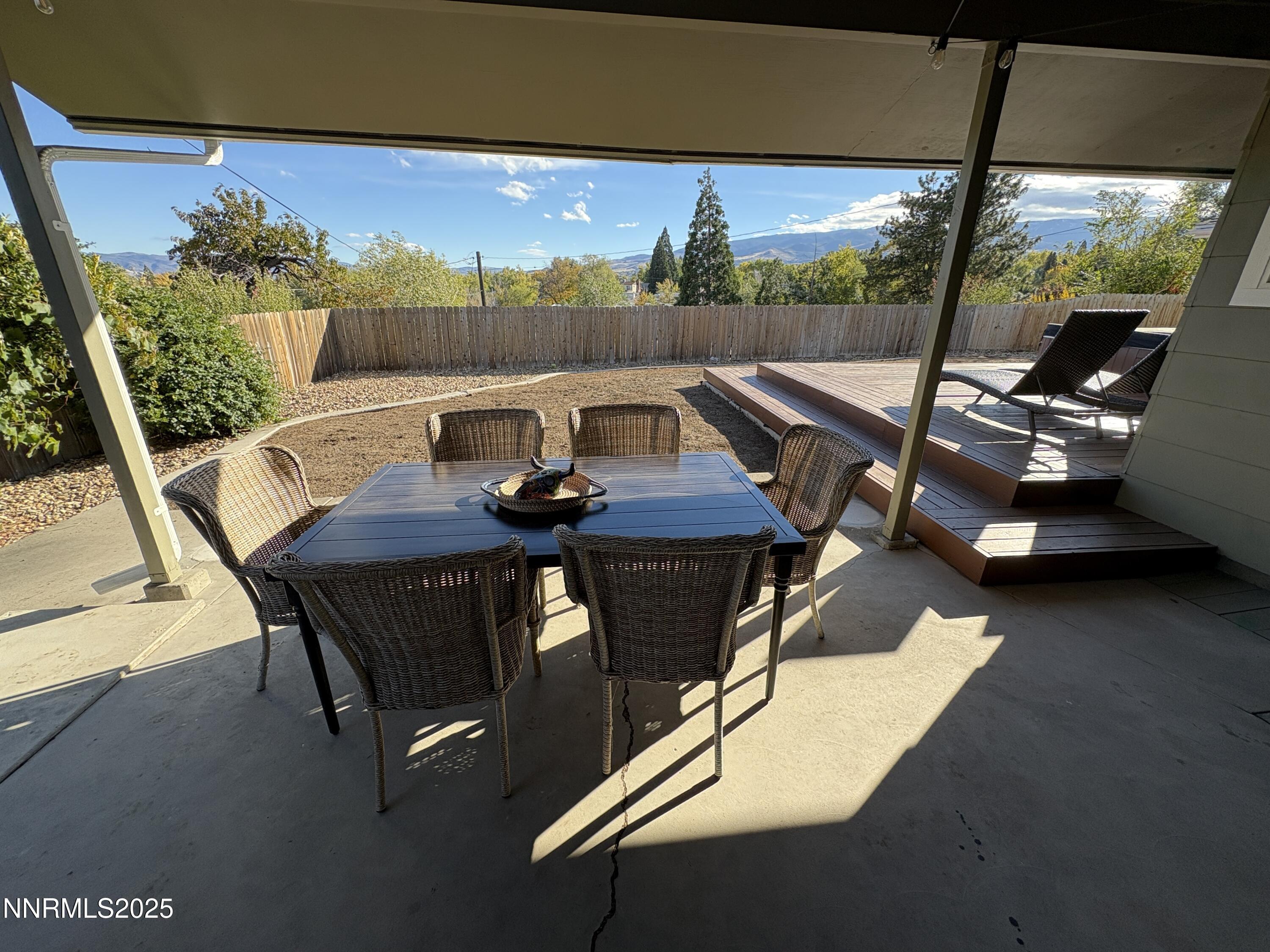 2000 Royal Drive Reno, NV 89503 - Photo 24 of 33 a view of a patio with table and chairs under an umbrella