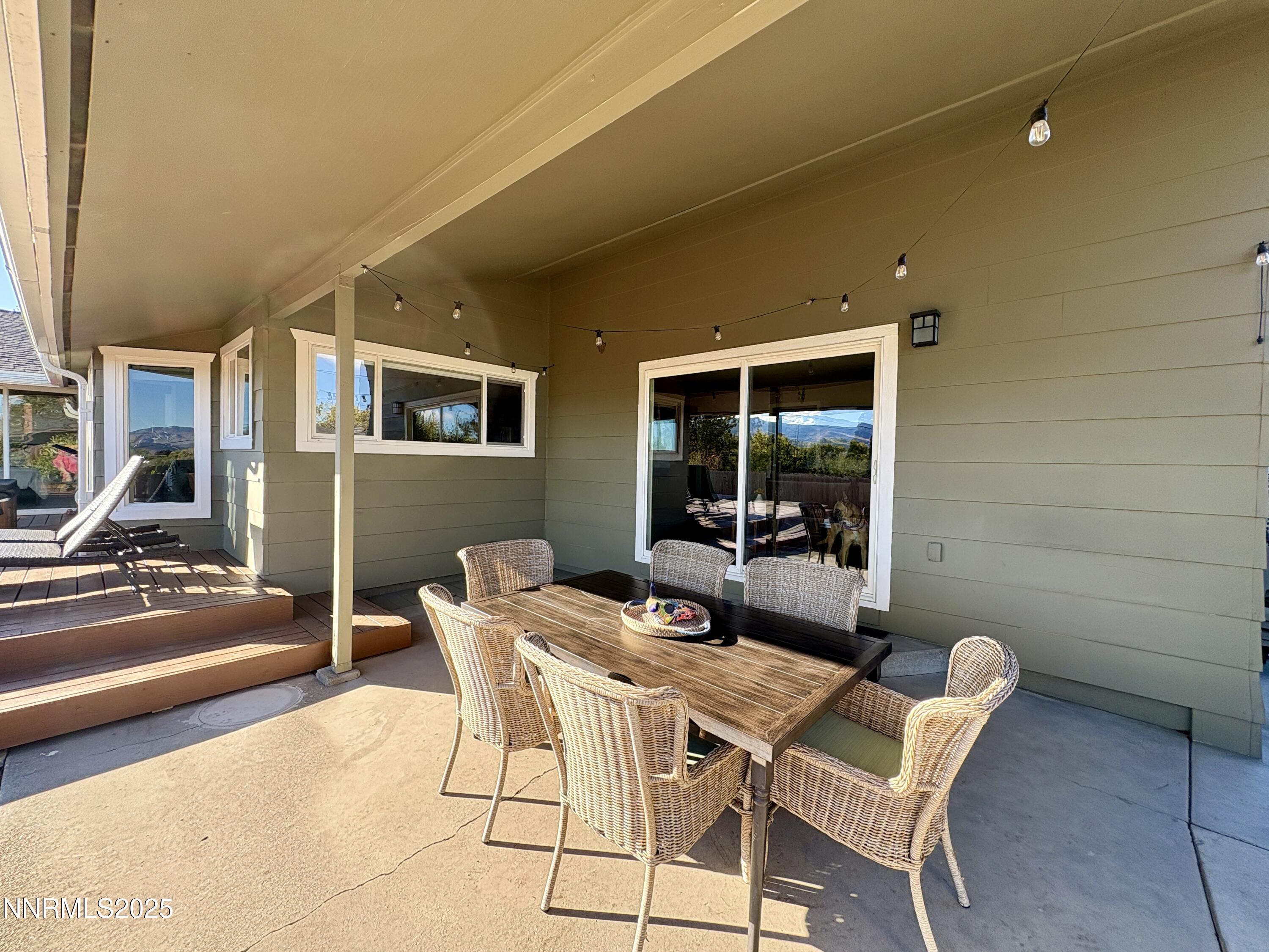 2000 Royal Drive Reno, NV 89503 - Photo 25 of 33 a dining room with furniture and a potted plant