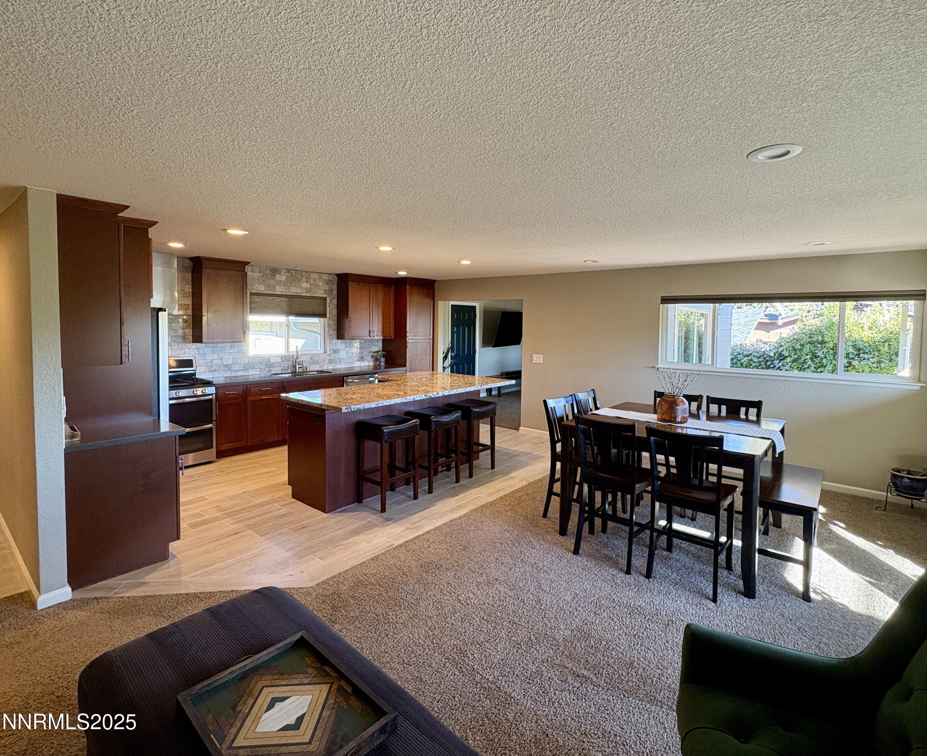 2000 Royal Drive Reno, NV 89503 - Photo 5 of 33 a large kitchen with a table and chairs