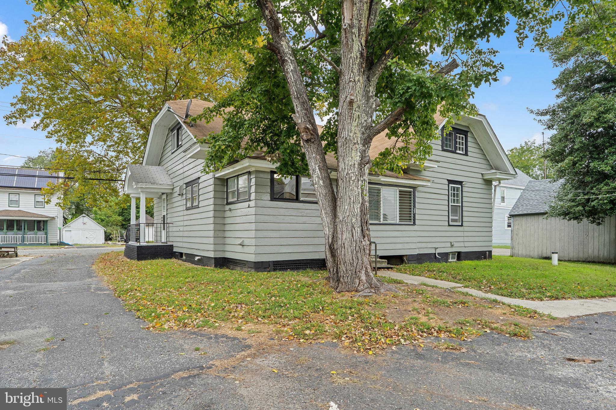 414 Main Street Dorchester, NJ 08316 - Photo 19 of 22 a view of a house with a yard