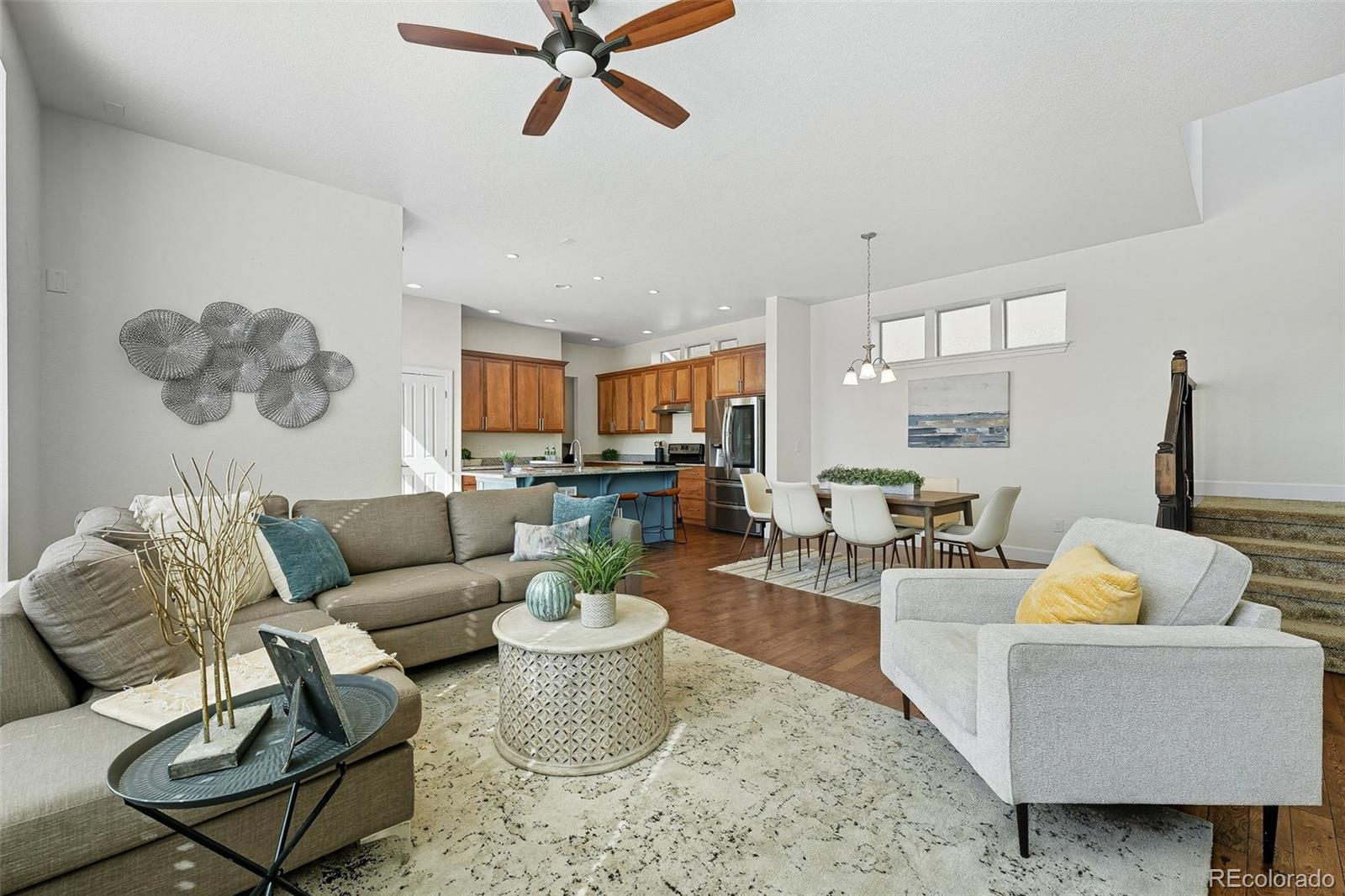 5207 Clinton Street Denver, CO 80238 - Photo 7 of 43 a living room with furniture and a large window