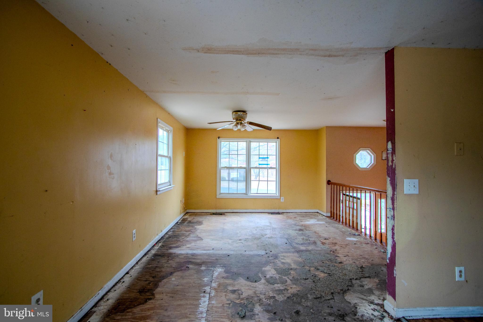 12707 Duckettown Road Laurel, MD 20708 - Photo 11 of 21 a view of a hallway with windows