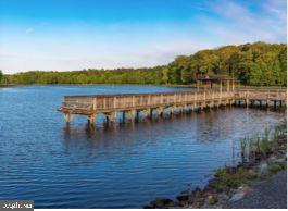12707 Duckettown Road Laurel, MD 20708 - Photo 17 of 21 a view of a lake with houses in the back