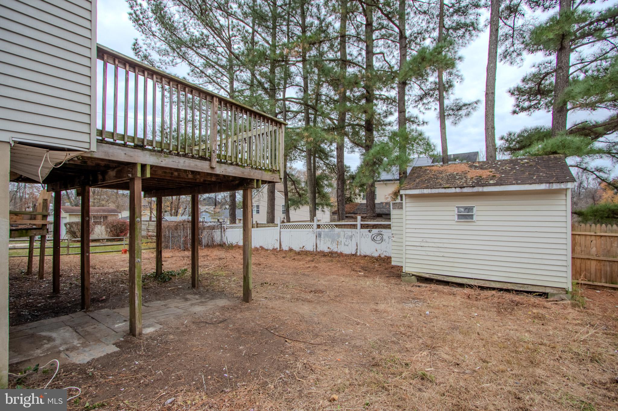 12707 Duckettown Road Laurel, MD 20708 - Photo 3 of 21 a view of a chairs and table in the back yard