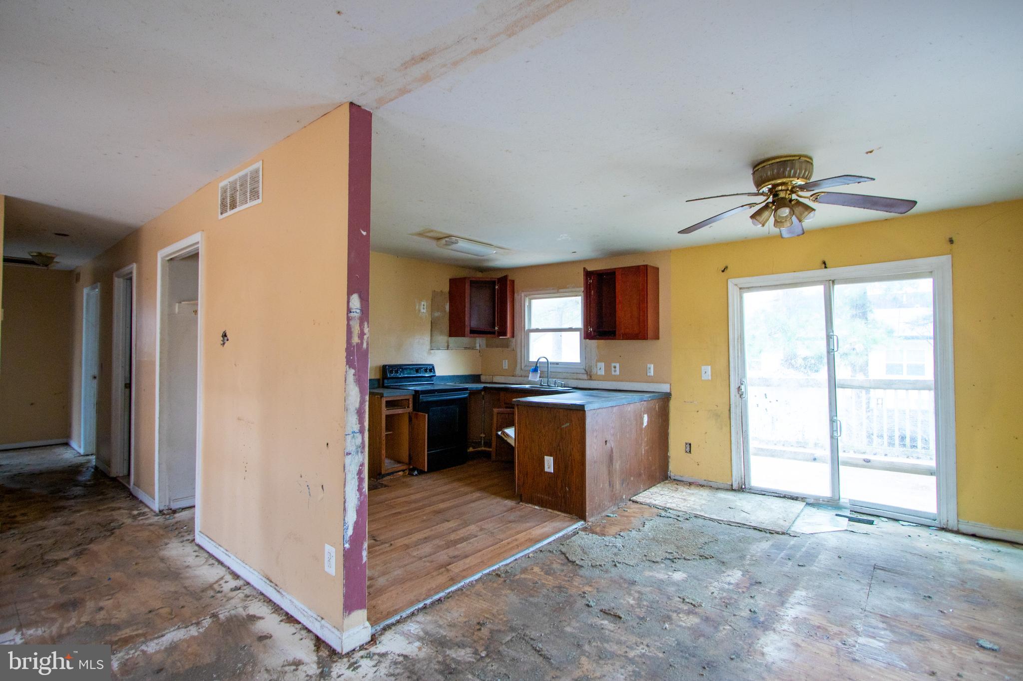 12707 Duckettown Road Laurel, MD 20708 - Photo 6 of 21 a view of kitchen with sink cabinets and window