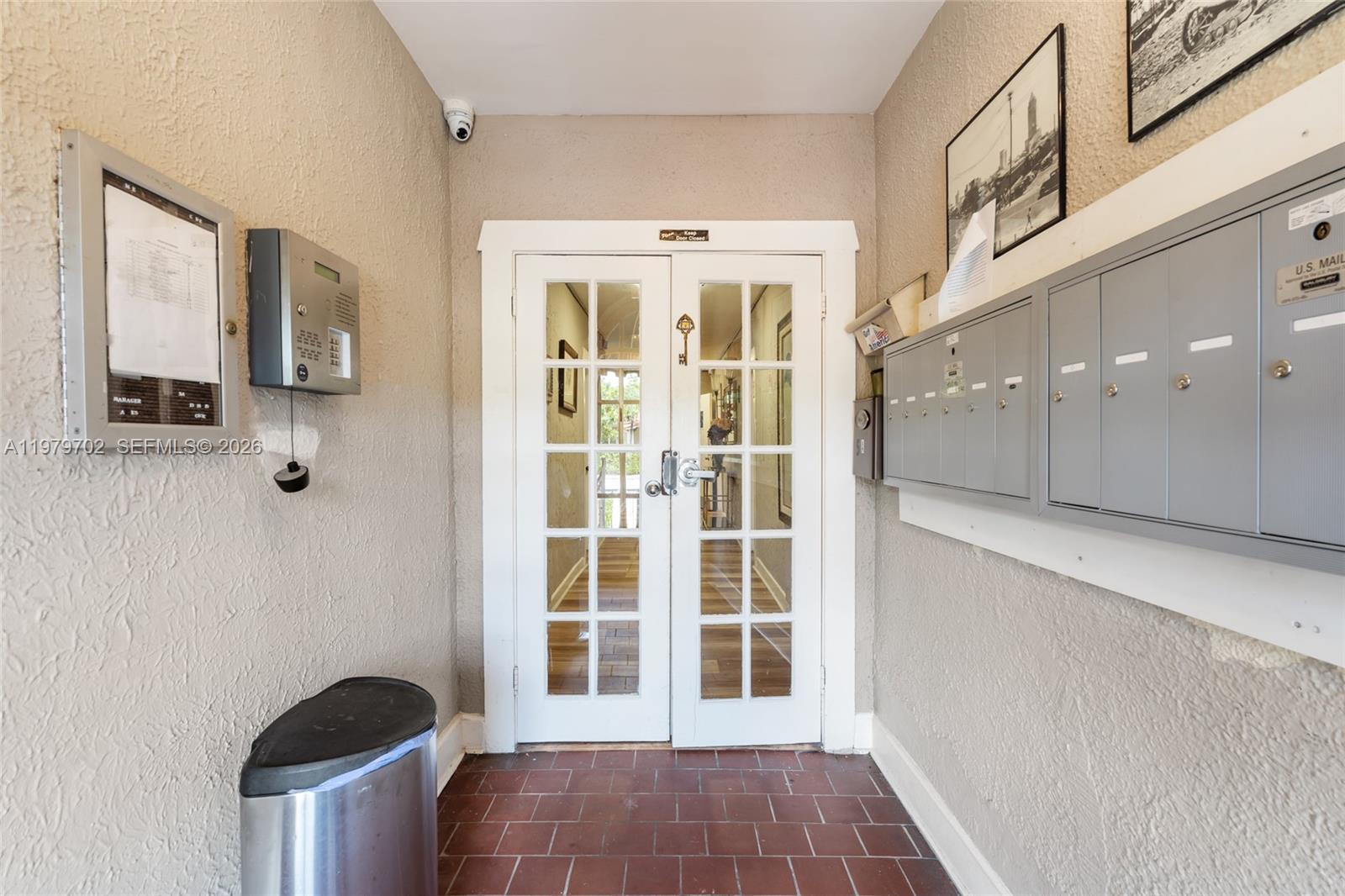 3409 South Le Jeune Road Coral Gables, FL 33134 - Photo 31 of 53 a view of a hallway with windows and entryway