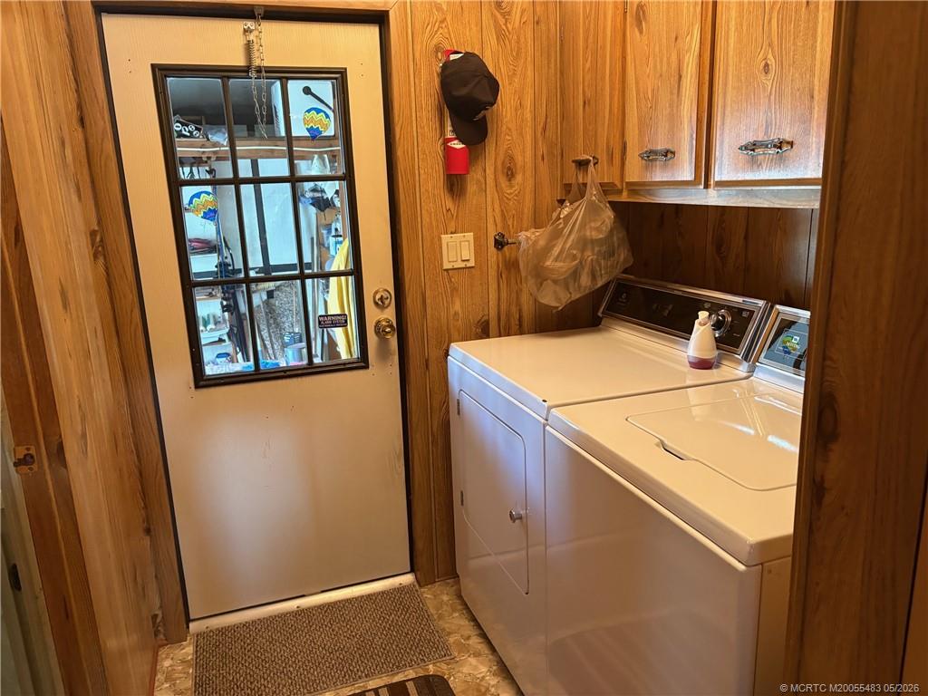 2856 Southwest Toronado Trail Stuart, FL 34997 - Photo 16 of 20 a utility room with dryer and washer