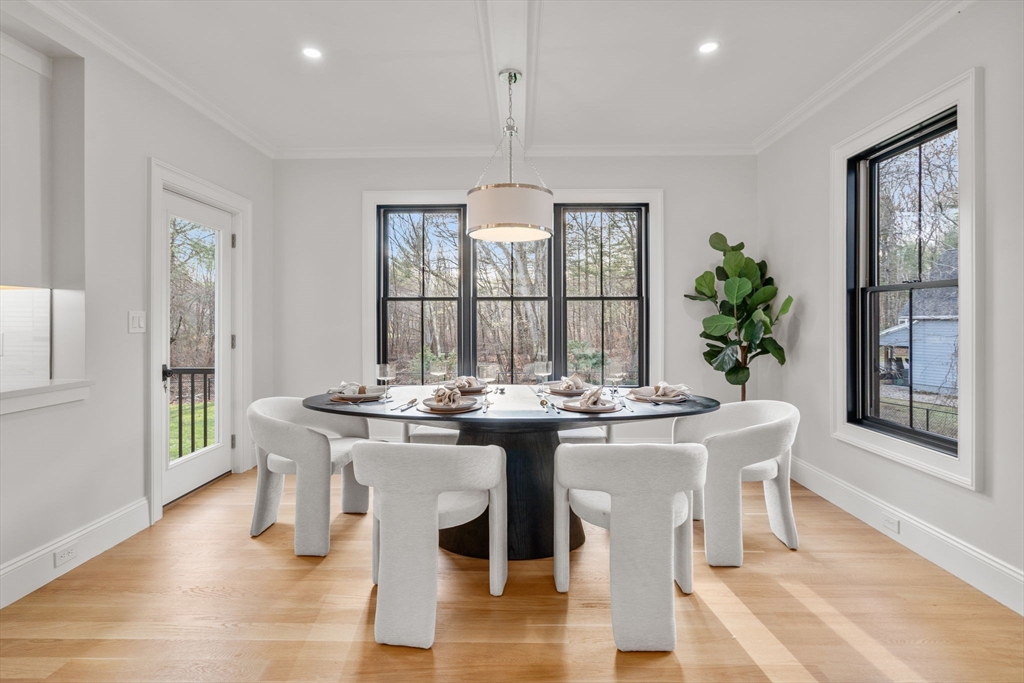 36 Kingswood Road Westwood, MA 02090 - Photo 12 of 40 a view of a dining room with furniture window and wooden floor