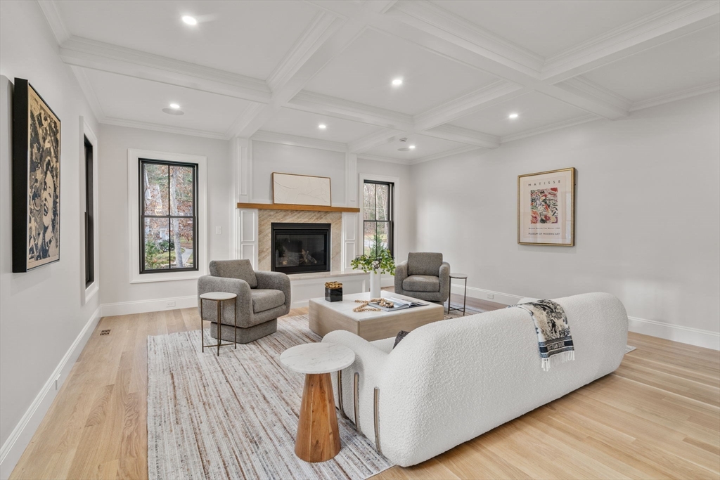 36 Kingswood Road Westwood, MA 02090 - Photo 14 of 40 a living room with furniture and a fireplace