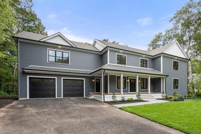 a room that has a bed and a window in it