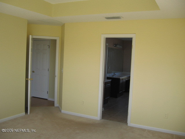 221 Porta Rosa Circle St. Augustine, FL 32092 - Photo 8 of 17 a view of a hallway with closet