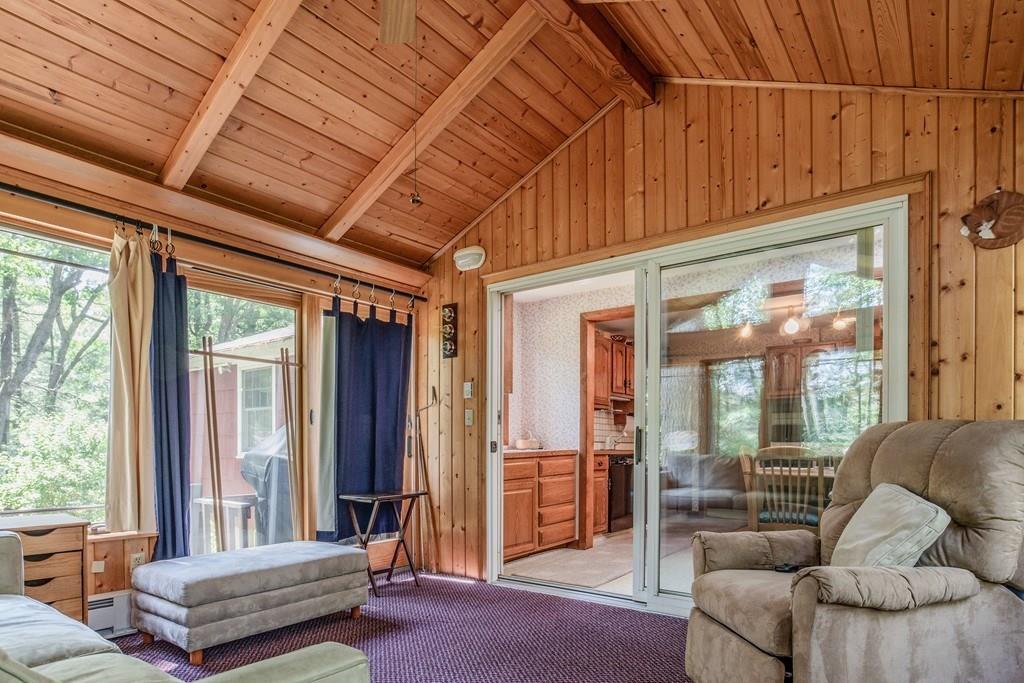 61 Hickory Road Sudbury, MA 01776 - Photo 15 of 29 a living room with furniture and a large window
