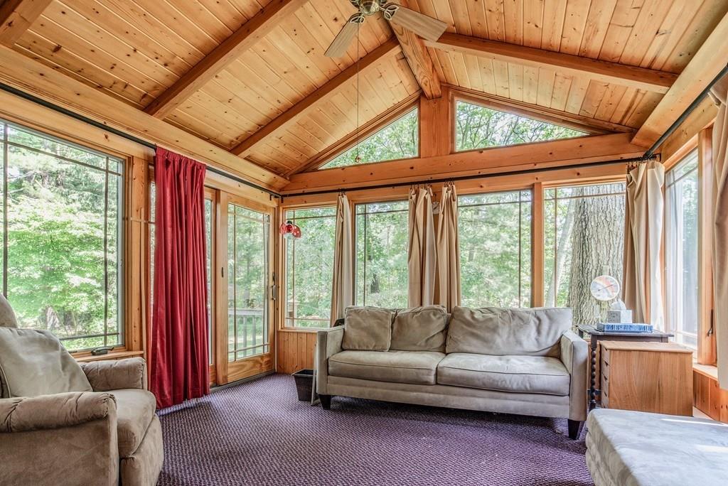 61 Hickory Road Sudbury, MA 01776 - Photo 16 of 29 a living room with furniture and large windows