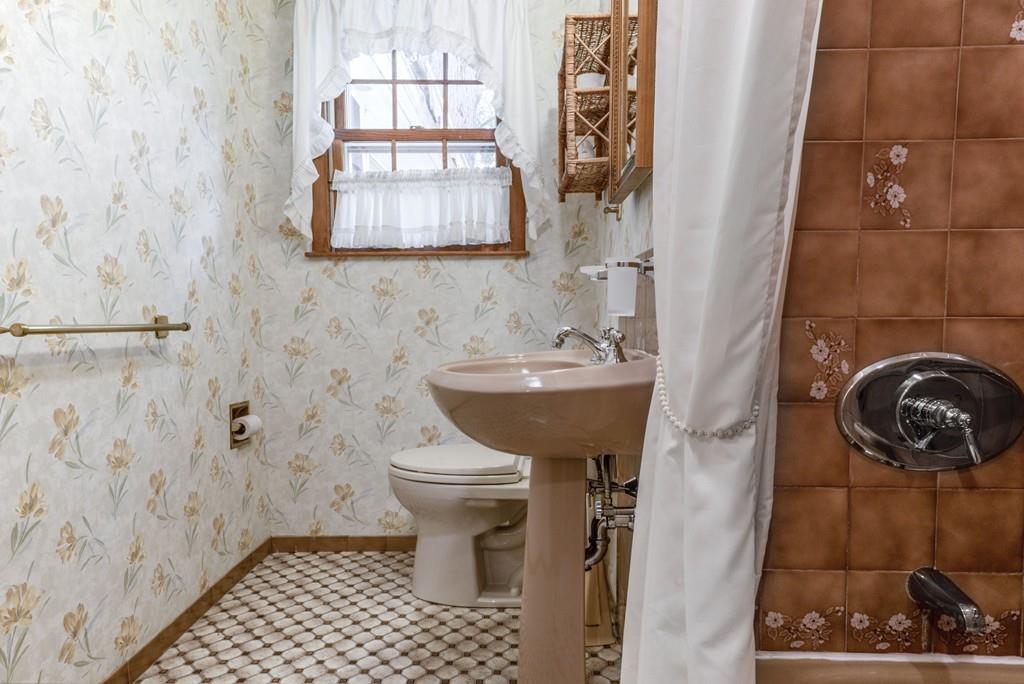61 Hickory Road Sudbury, MA 01776 - Photo 17 of 29 a bathroom with a sink and a toilet
