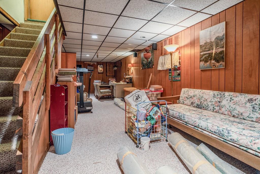 61 Hickory Road Sudbury, MA 01776 - Photo 25 of 29 a living room with furniture and a couch