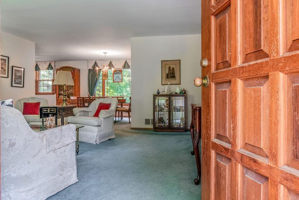 61 Hickory Road Sudbury, MA 01776 - Photo 3 of 29 a living room with furniture and a large window