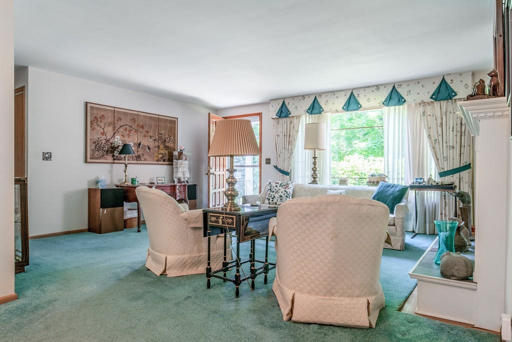 61 Hickory Road Sudbury, MA 01776 - Photo 6 of 29 a living room with furniture and a large window