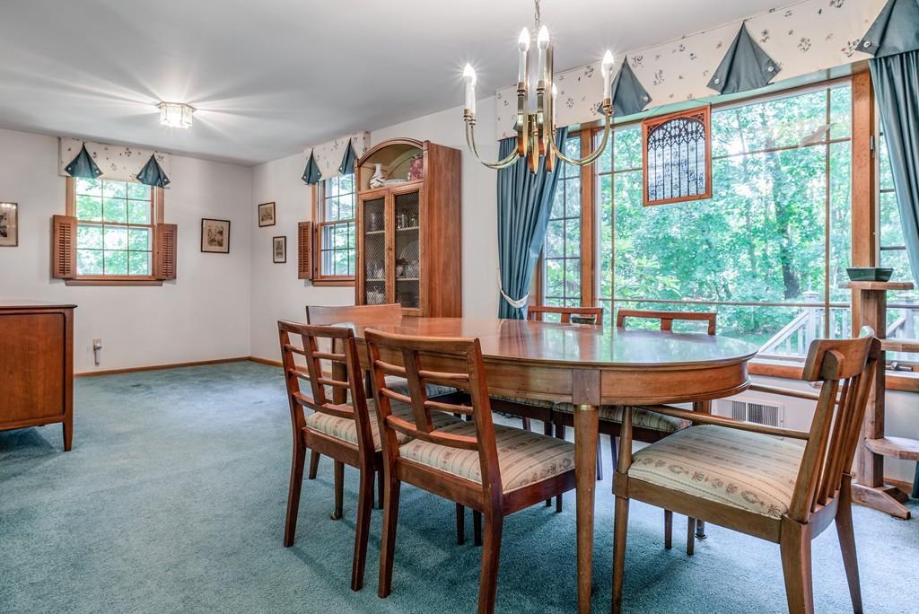 61 Hickory Road Sudbury, MA 01776 - Photo 7 of 29 a dining room with furniture and window