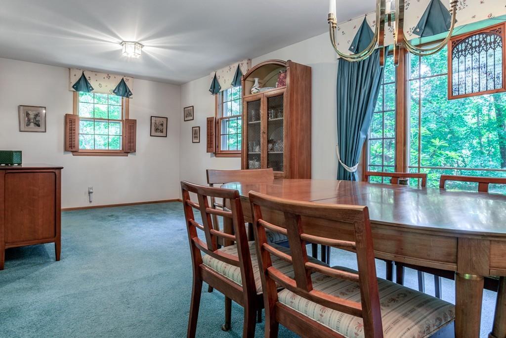 61 Hickory Road Sudbury, MA 01776 - Photo 9 of 29 a view of a dining room with furniture window and wooden floor