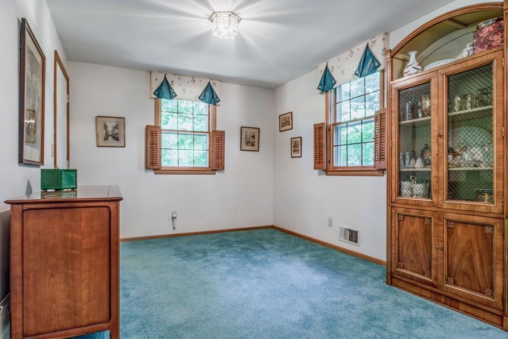 61 Hickory Road Sudbury, MA 01776 - Photo 10 of 29 an empty room with windows