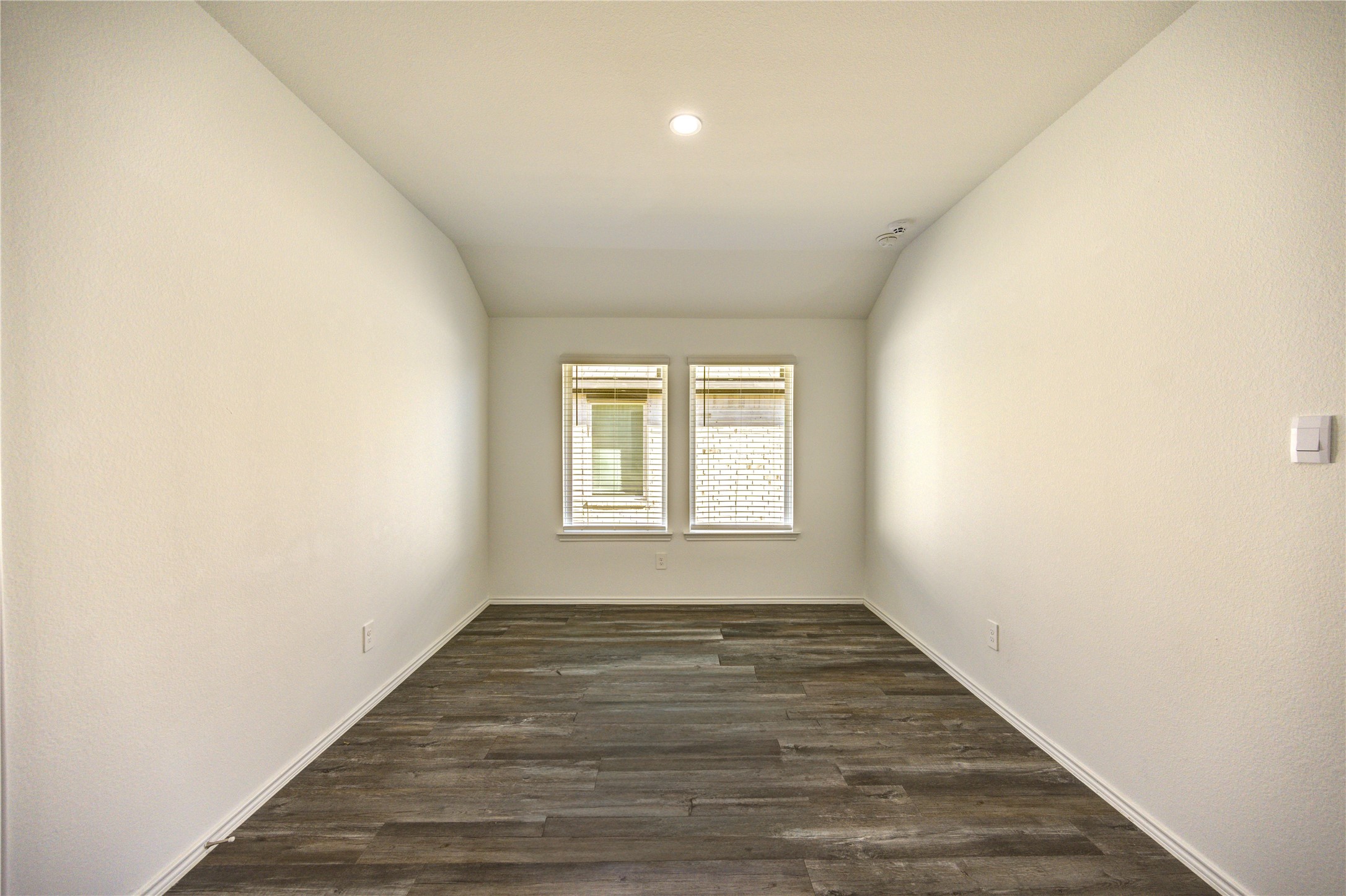 5406 Castlebury Meadows Dr Spring Spring, TX 77373 - Photo 13 of 34 an empty room with wooden floor and windows