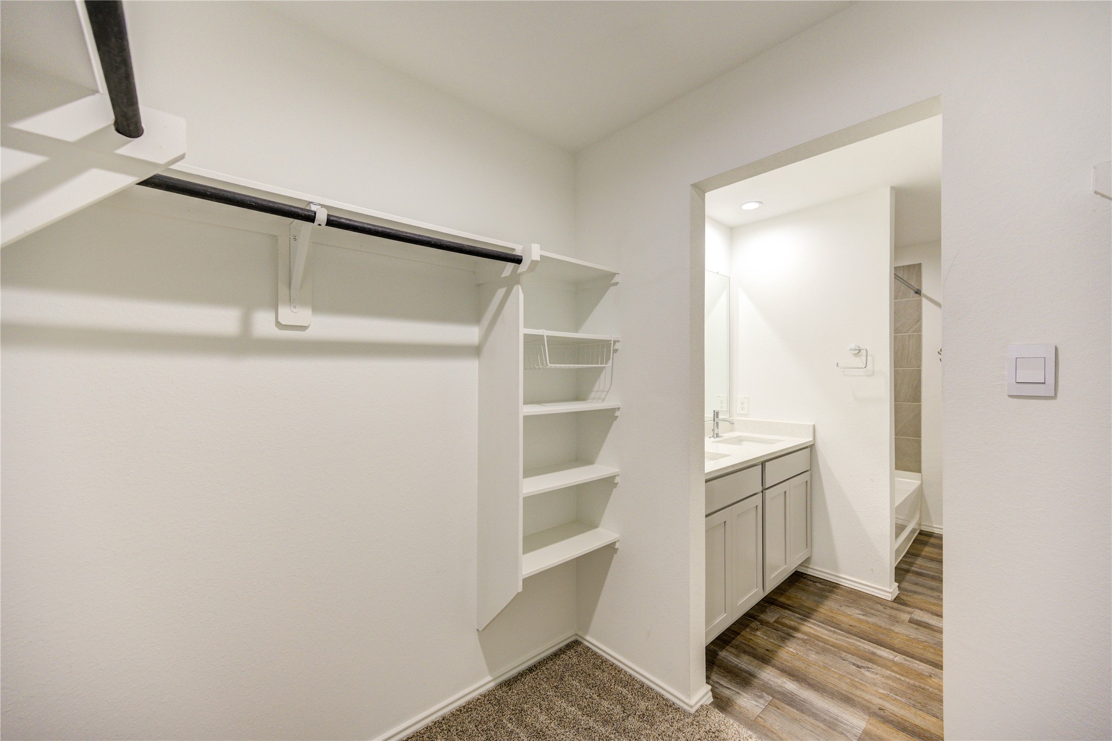 5406 Castlebury Meadows Dr Spring Spring, TX 77373 - Photo 18 of 34 a view of an empty walk in closet