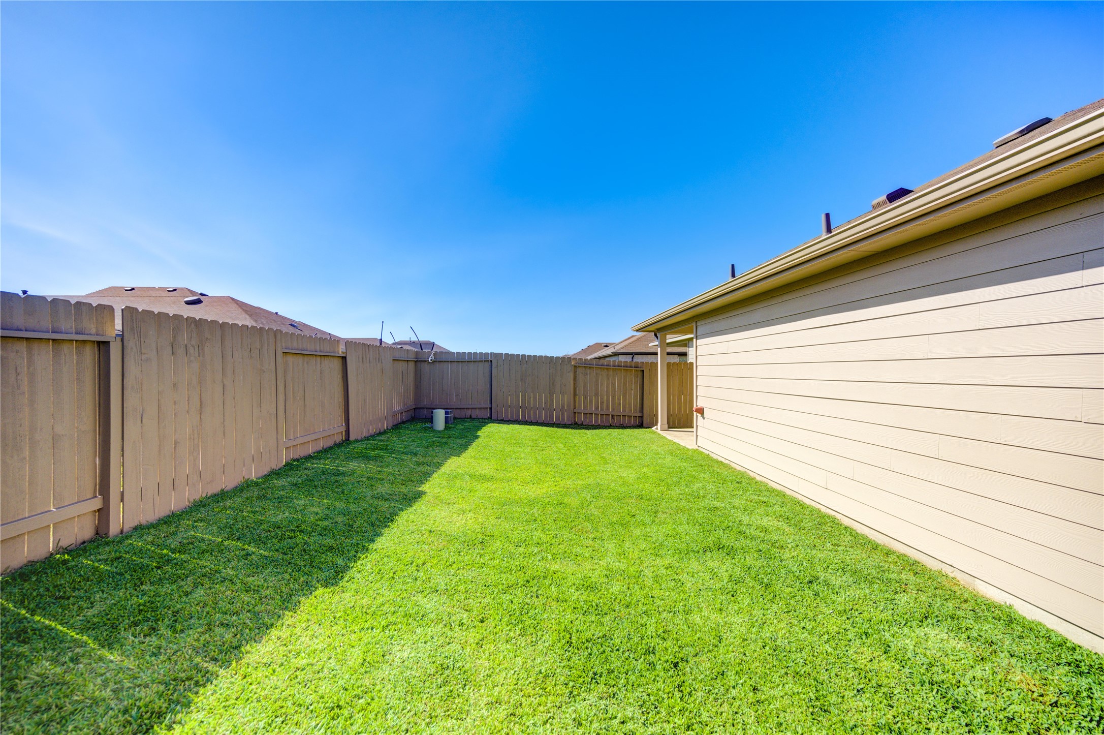 5406 Castlebury Meadows Dr Spring Spring, TX 77373 - Photo 33 of 34 a view of a backyard with potted plants