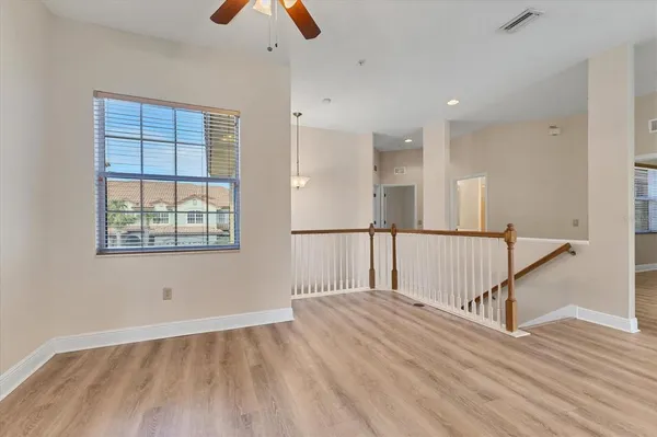 a view of entryway with wooden floor