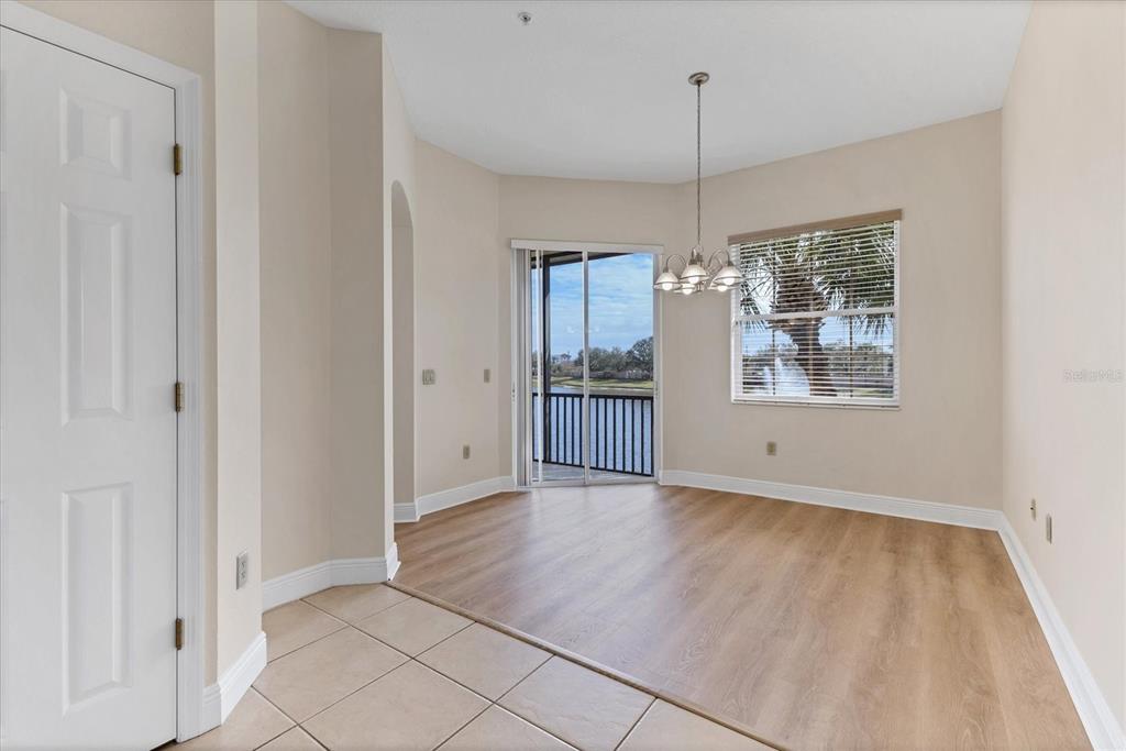 8411 Miramar Way, Unit 202 Lakewood Ranch, FL 34202 - Photo 16 of 37 an empty room with windows and entrance