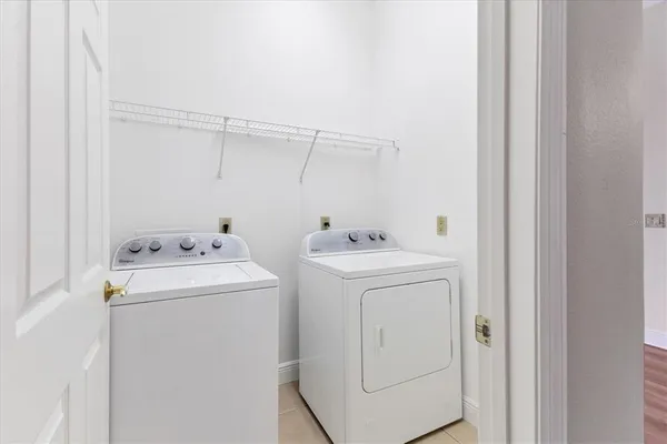 a utility room with dryer and washer