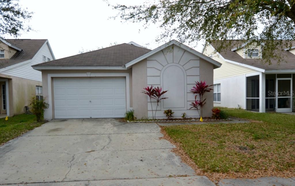 5723 Tanagerlake Road Lithia, FL 33547 - Photo 1 of 1 a front view of house with yard