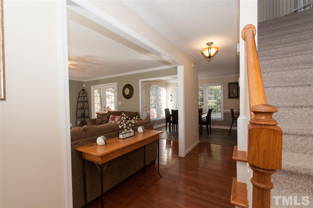 3205 Arden Branch Lane Raleigh, NC 27616 - Photo 17 of 22 a living room with furniture and a table