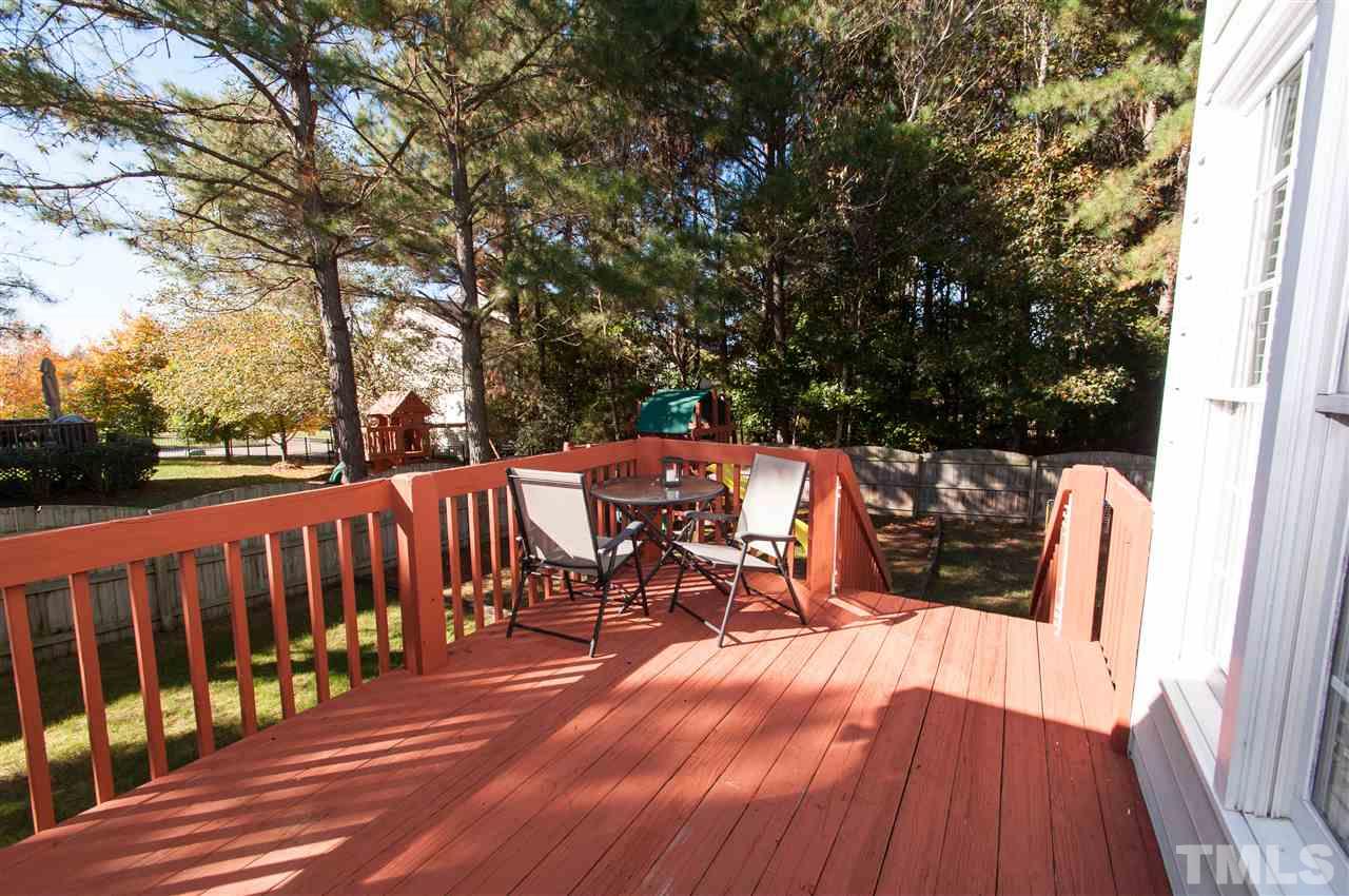 3205 Arden Branch Lane Raleigh, NC 27616 - Photo 18 of 22 a view of a chairs on a deck