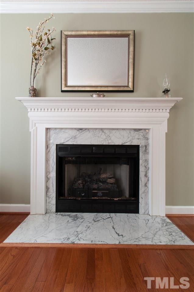 3205 Arden Branch Lane Raleigh, NC 27616 - Photo 4 of 22 a view of fireplace and a living room
