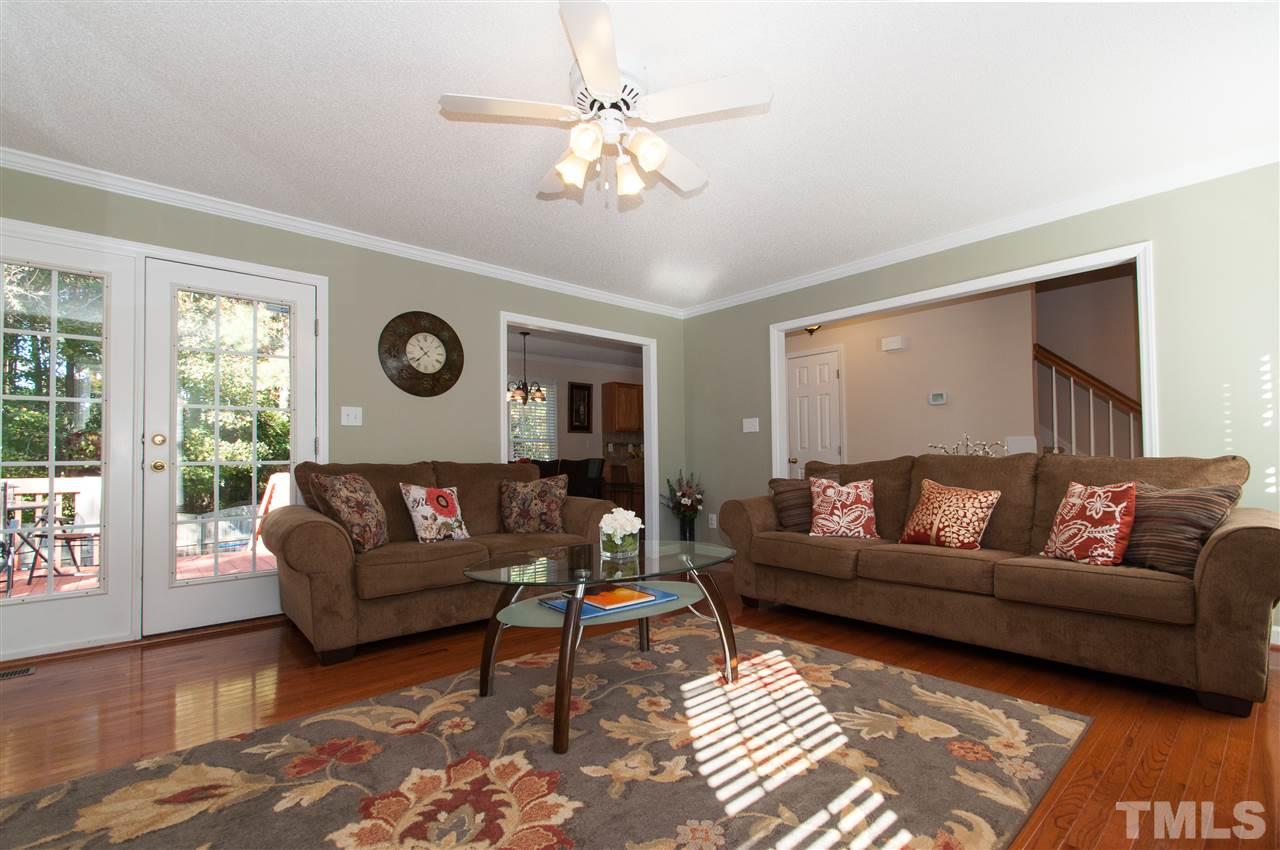 3205 Arden Branch Lane Raleigh, NC 27616 - Photo 5 of 22 a living room with furniture and a large window