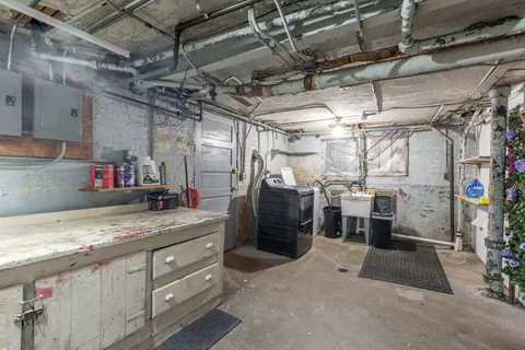 a utility room with cabinets