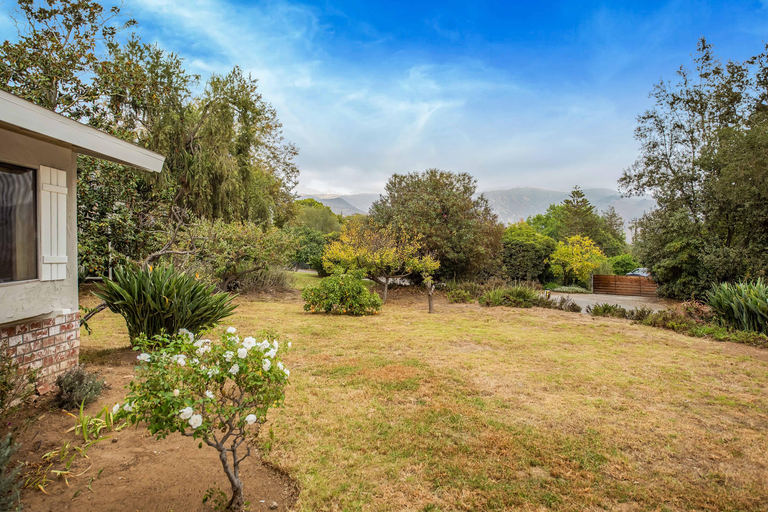 7458 Shepard Mesa Road Carpinteria, CA 93013 - Photo 2 of 17 a view of back yard of the house
