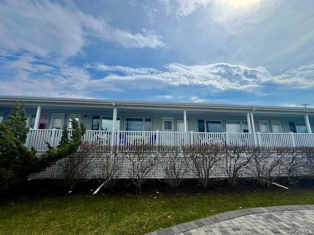 231 Dune Road, Unit 905 Westhampton Beach, NY 11978 - Photo 7 of 24 Boatel building where unit is