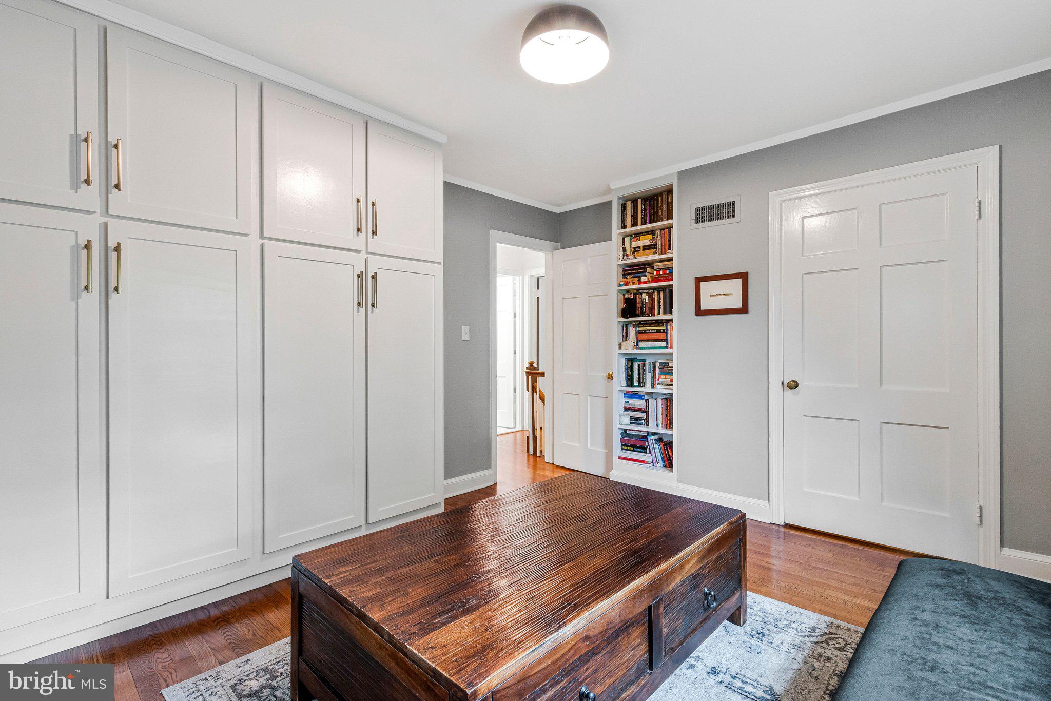 4745 Reservoir Road Northwest Washington, DC 20007 - Photo 36 of 47 2nd BR with wall of closets and built-in shelves.